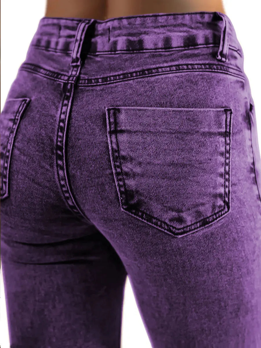 Ladies' vintage purple flared jeans. Distressed, elastic, slimming, casual, mid-rise jeans.