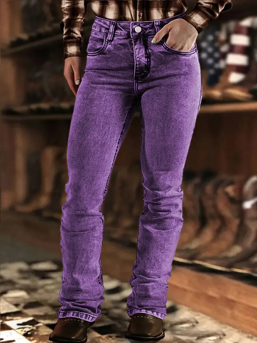 Ladies' vintage purple flared jeans. Distressed, elastic, slimming, casual, mid-rise jeans.